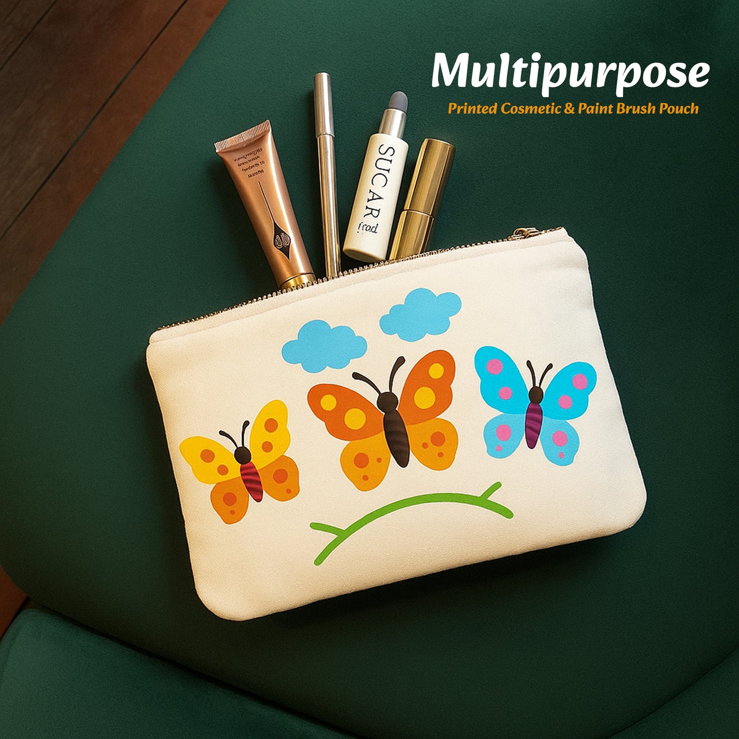 Cosmetic pouch with butterfly design on a green surface, containing makeup items.