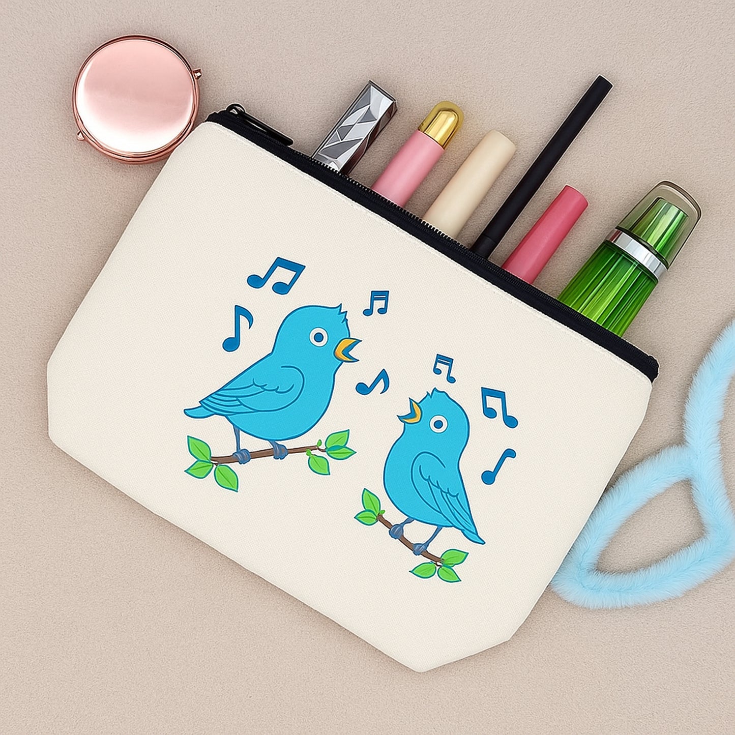 White pouch with blue bird design on a beige background