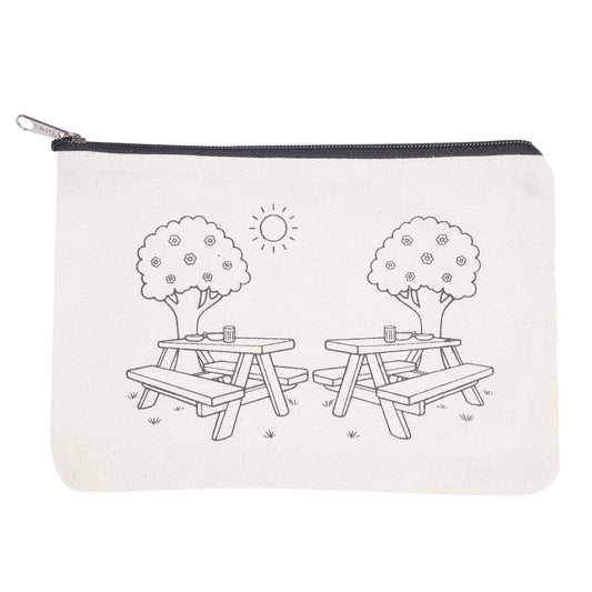 Pouch with black and white illustration of picnic tables and trees on a white background