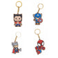 Set of four superhero keychains on a white background