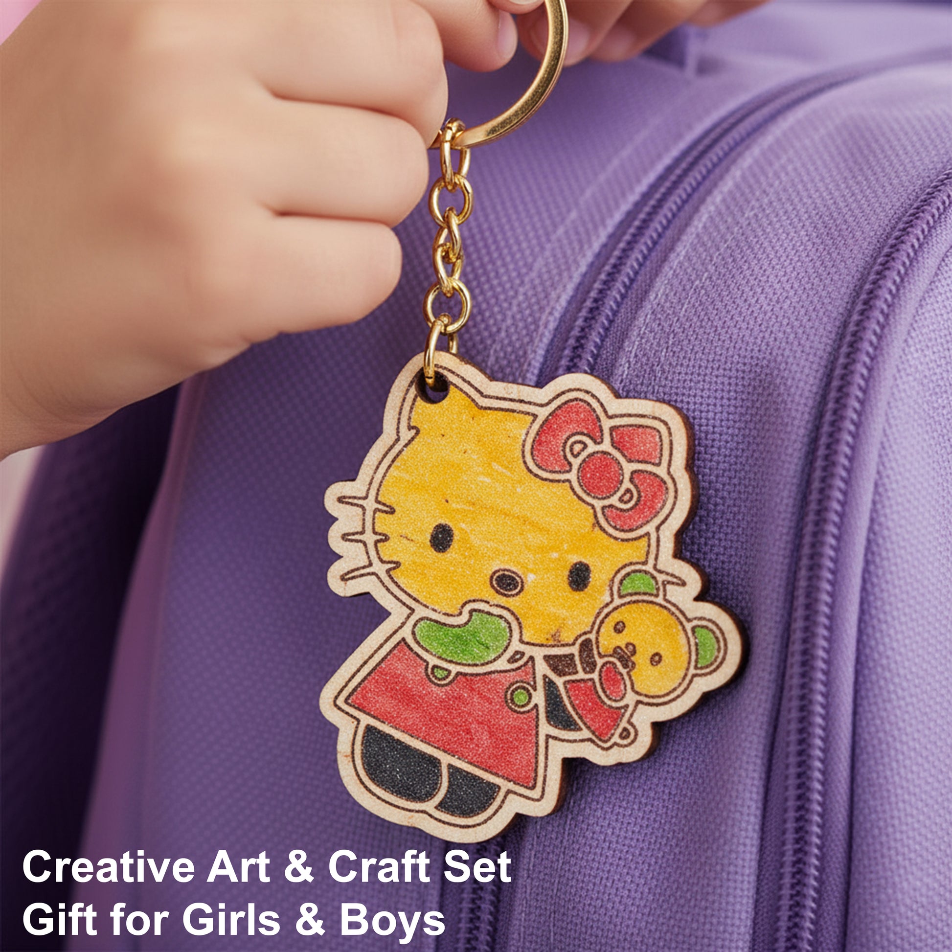 Keychain with cartoon character held by a hand on a purple background