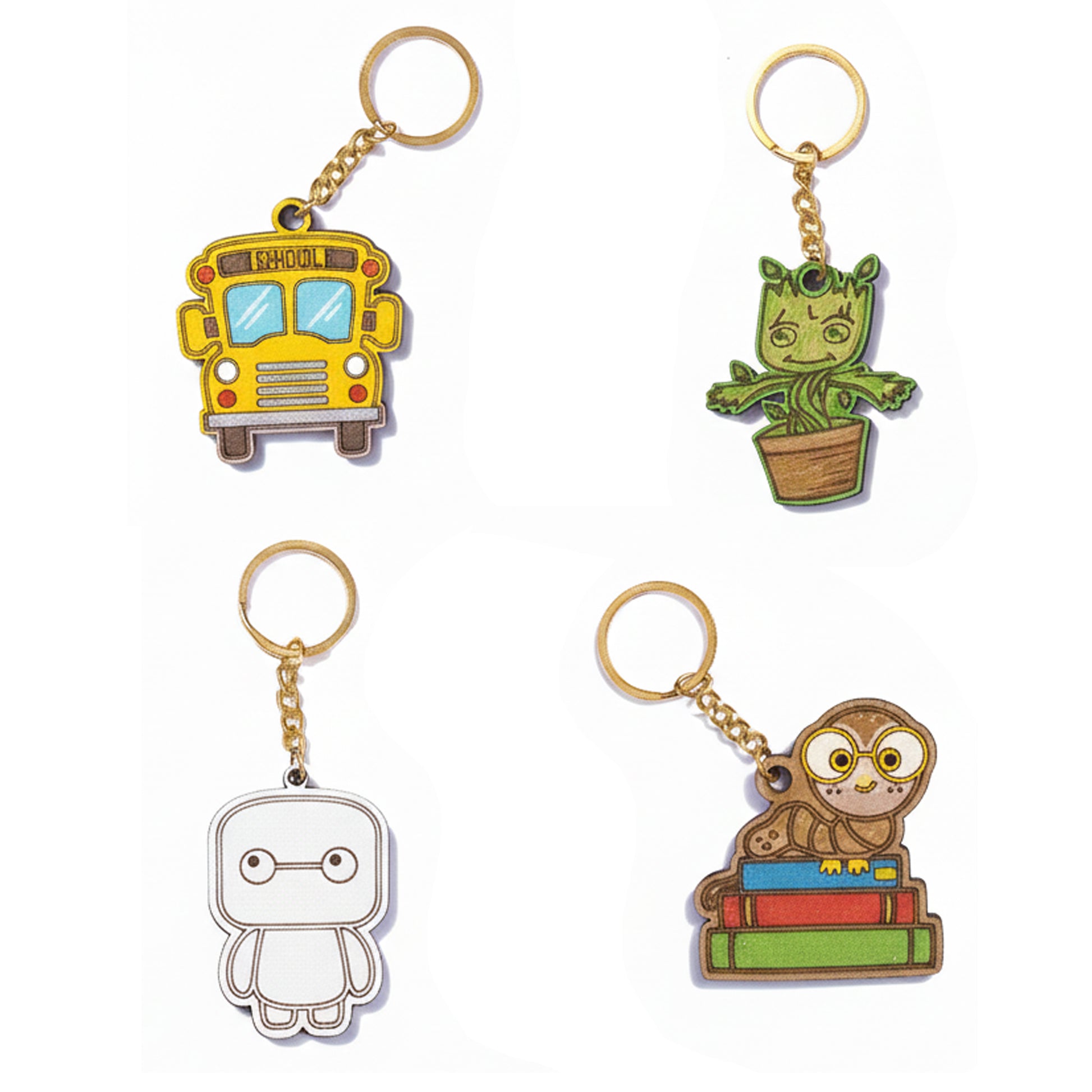 Four keychains with different designs on a white background