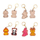 Set of animal-themed keychains on a white background